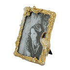 Design Republique Flamingo Large Gold Photo Frame with an ornate gold branch frame featuring floral details and a perched flamingo, displayed against a white background.