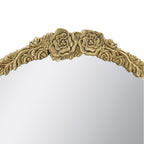 Close-up of the ornate gold floral detailing at the top of the Gracious Living arched mirror.