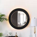 Design Plus Leona LED Mirror displayed on a wall with its warm LED backlighting illuminated in a styled interior.