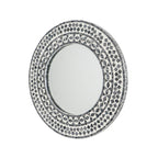 Angled view of the Design Republique Algaia Mirror showing the grey and white mosaic-style patterned frame and round reflective centre.
