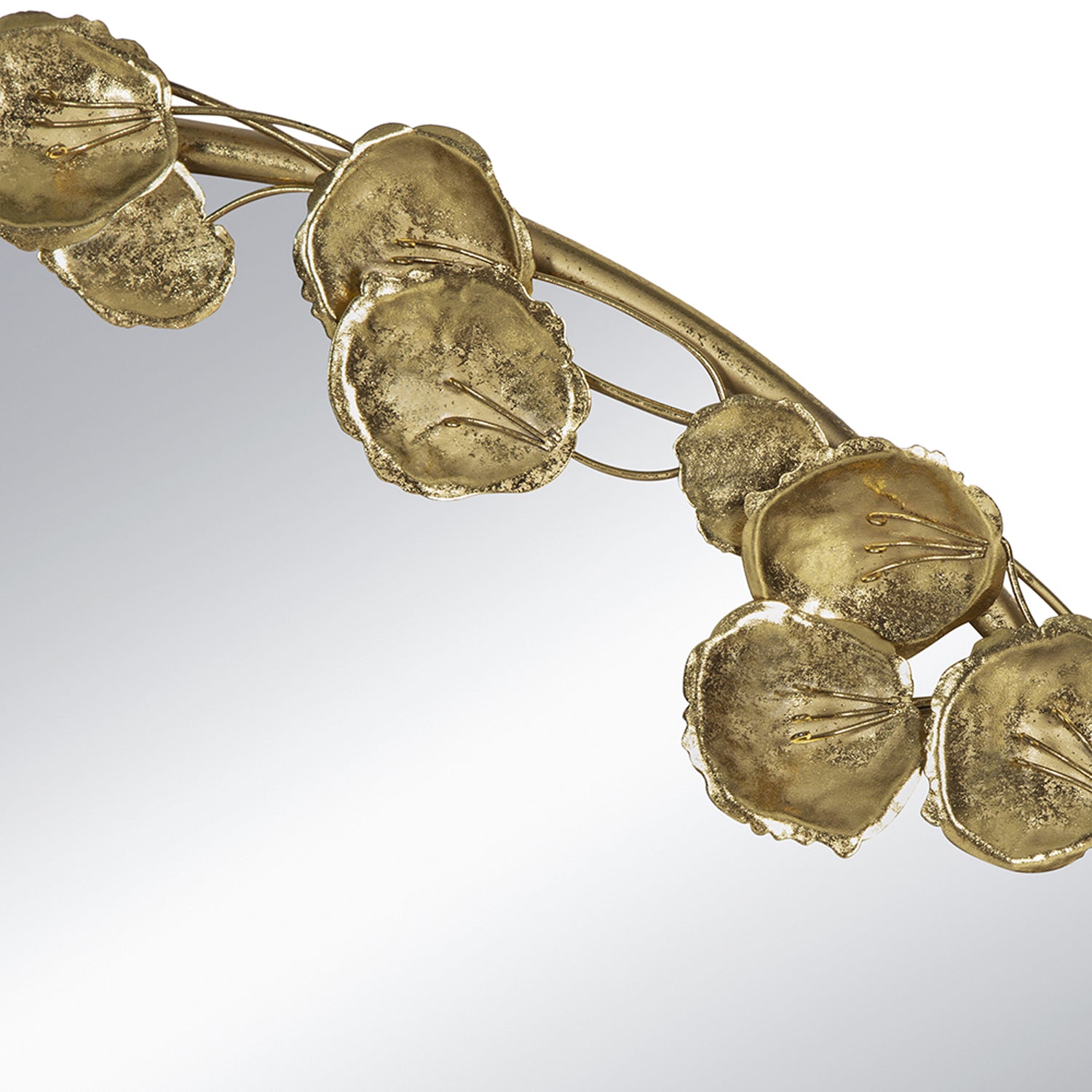 Close-up of the Gracious Living Gold Leaf Mirror highlighting the textured metallic leaf details and curved frame design.