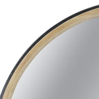 Close-up of the Design Republique Sienna Round Mirror highlighting the natural wood-look inner frame and contrasting black outer edge.