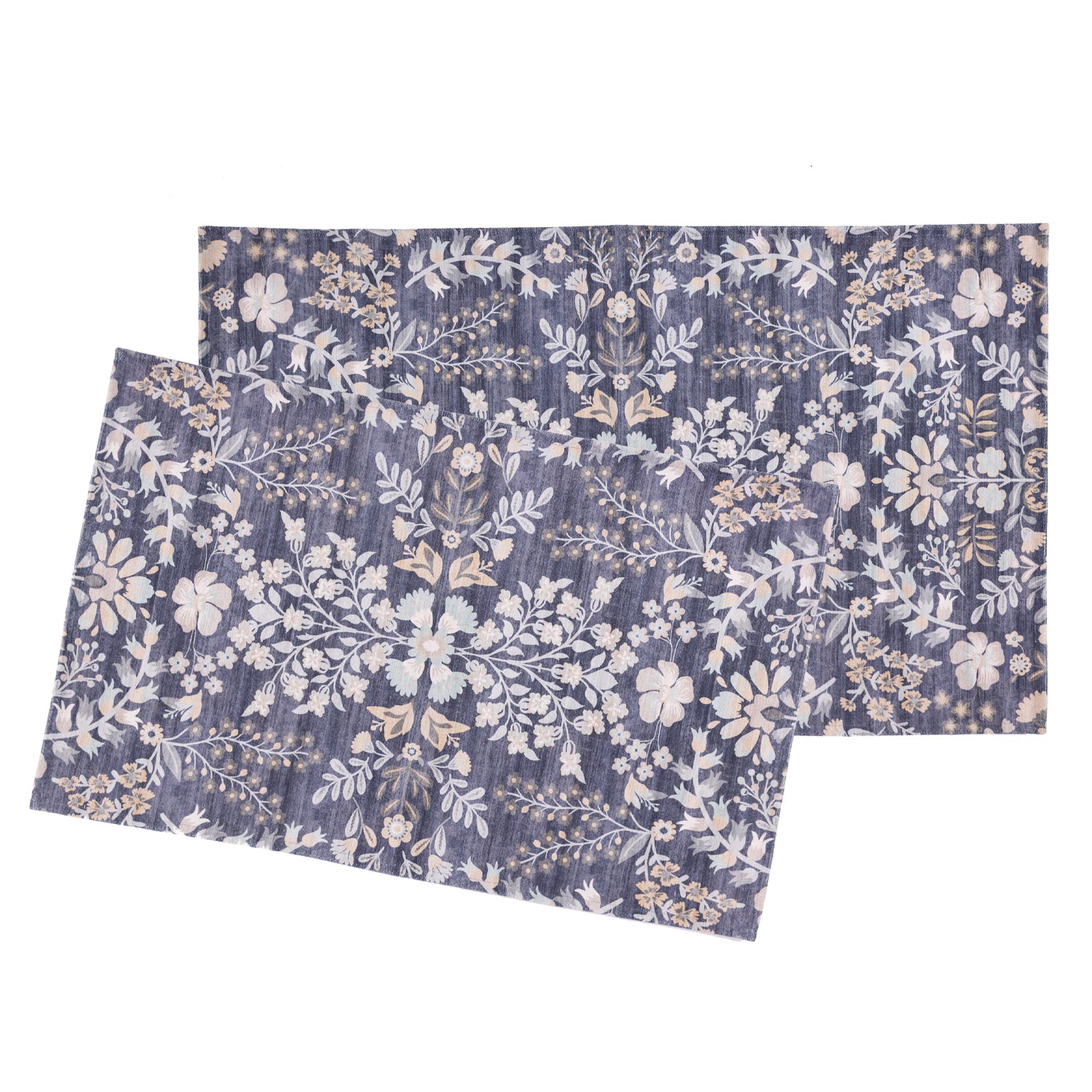 Two rectangular mats with a detailed botanical floral pattern in navy blue, cream, and beige, displayed overlapping on a solid white background.