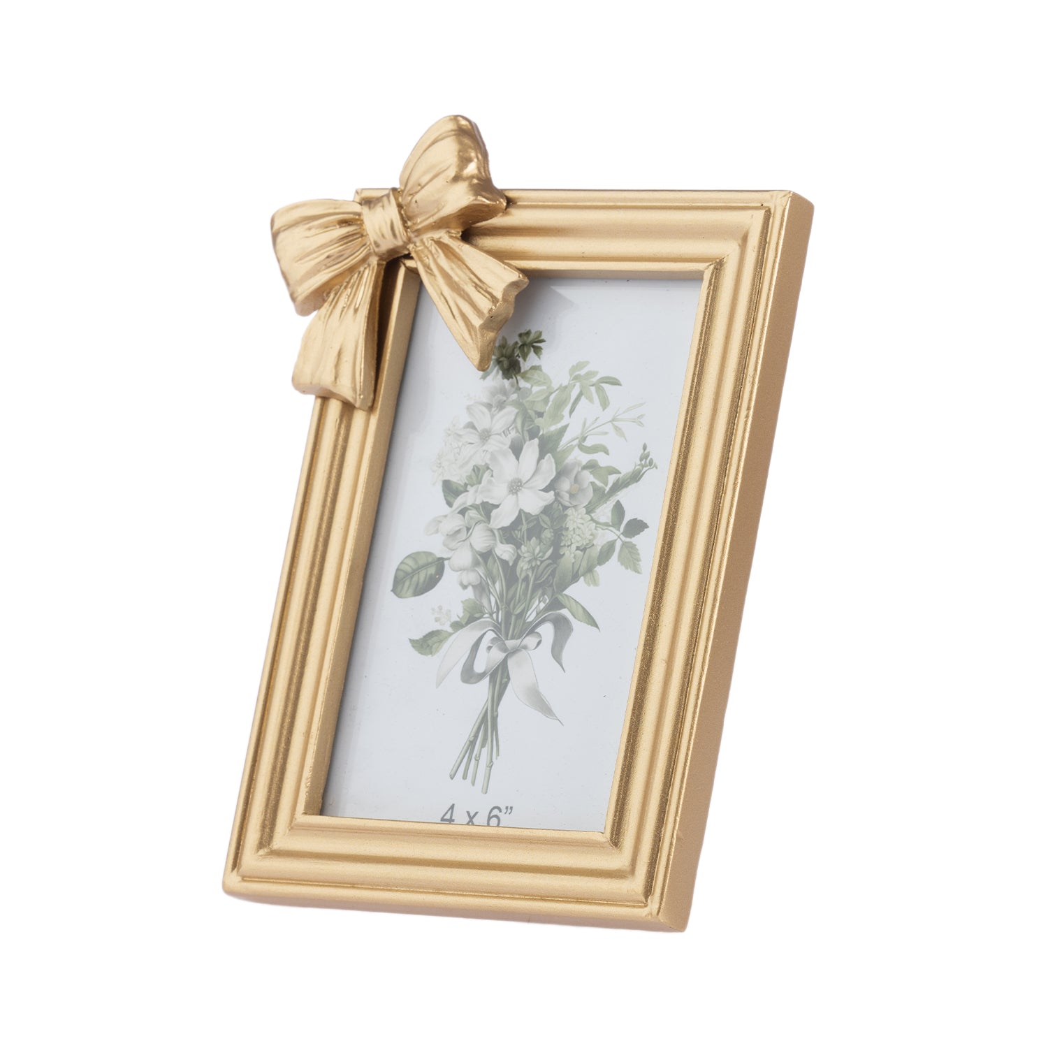A gold picture frame with a decorative bow on the top left corner, holding a white floral print, shown on a plain white background.