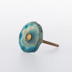 Blue agate slice drawer knob with natural stone banding, organic edges and gold-tone centre detail.