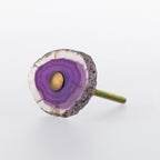 Purple agate slice drawer knob with natural stone banding, organic edges and gold-tone centre detail.