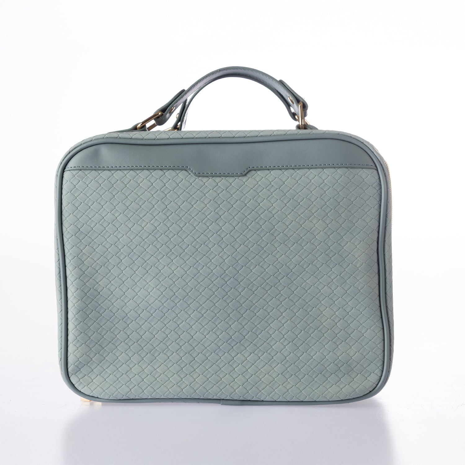 Blue woven-look vanity case with structured design, carry handle, and zip closure on a white background.

