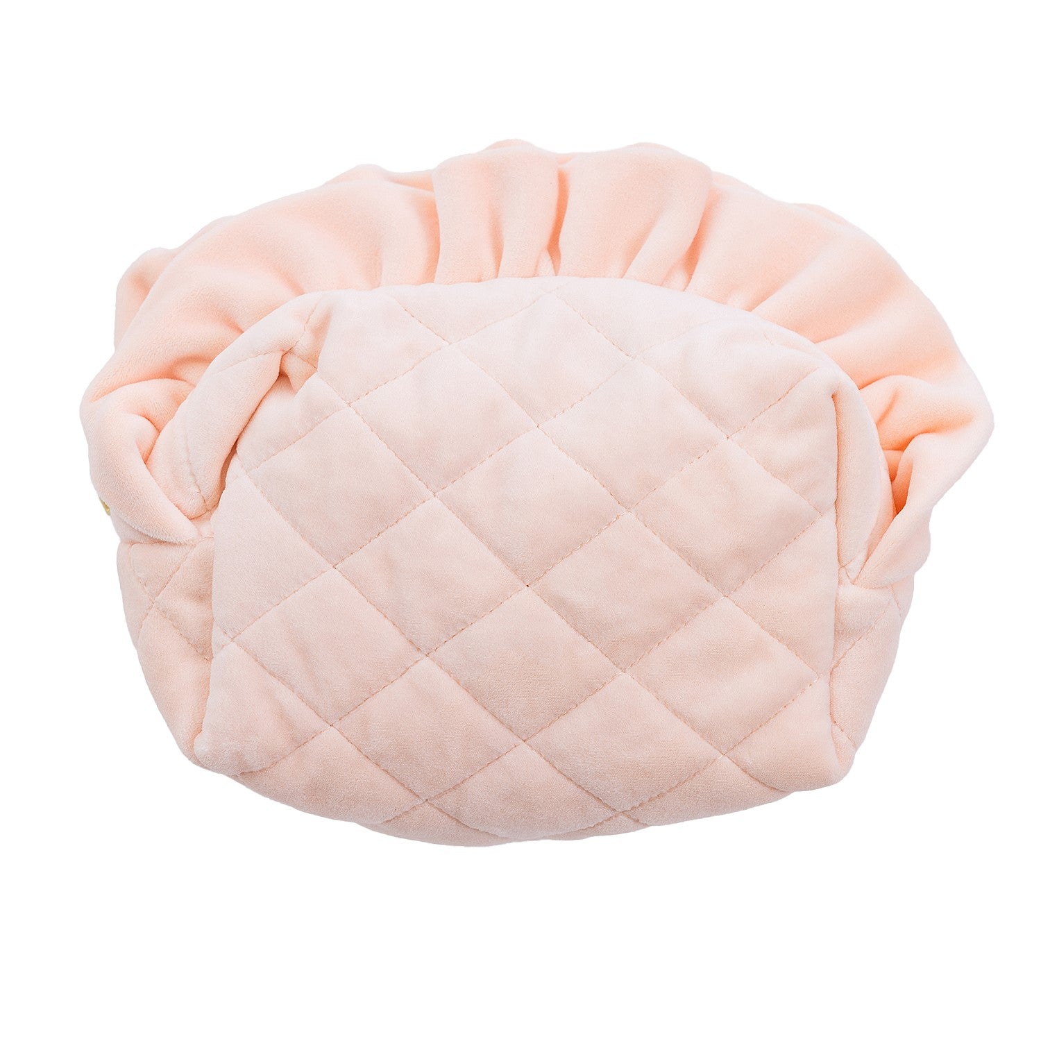 Round blush quilted cosmetic bag with soft gathered trim and padded design on a white background.

