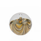 Large hand-crafted glass décor ball featuring an elegant swirled pattern in amber, smoke, and clear tones, designed to add depth, texture, and visual interest to shelves, consoles, and decorative displays.