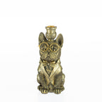 Decorative bulldog candleholder with gold glasses, bow tie, and crown on a white background.