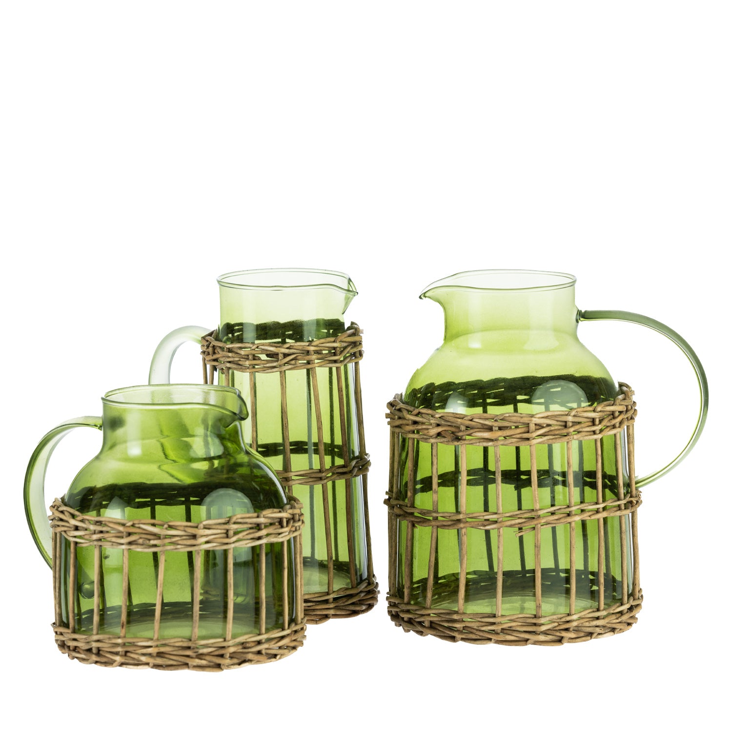 Design Republique Millie green glass pitchers in assorted sizes, featuring curved handles, pouring spouts and woven rattan-style wraps around the bases.