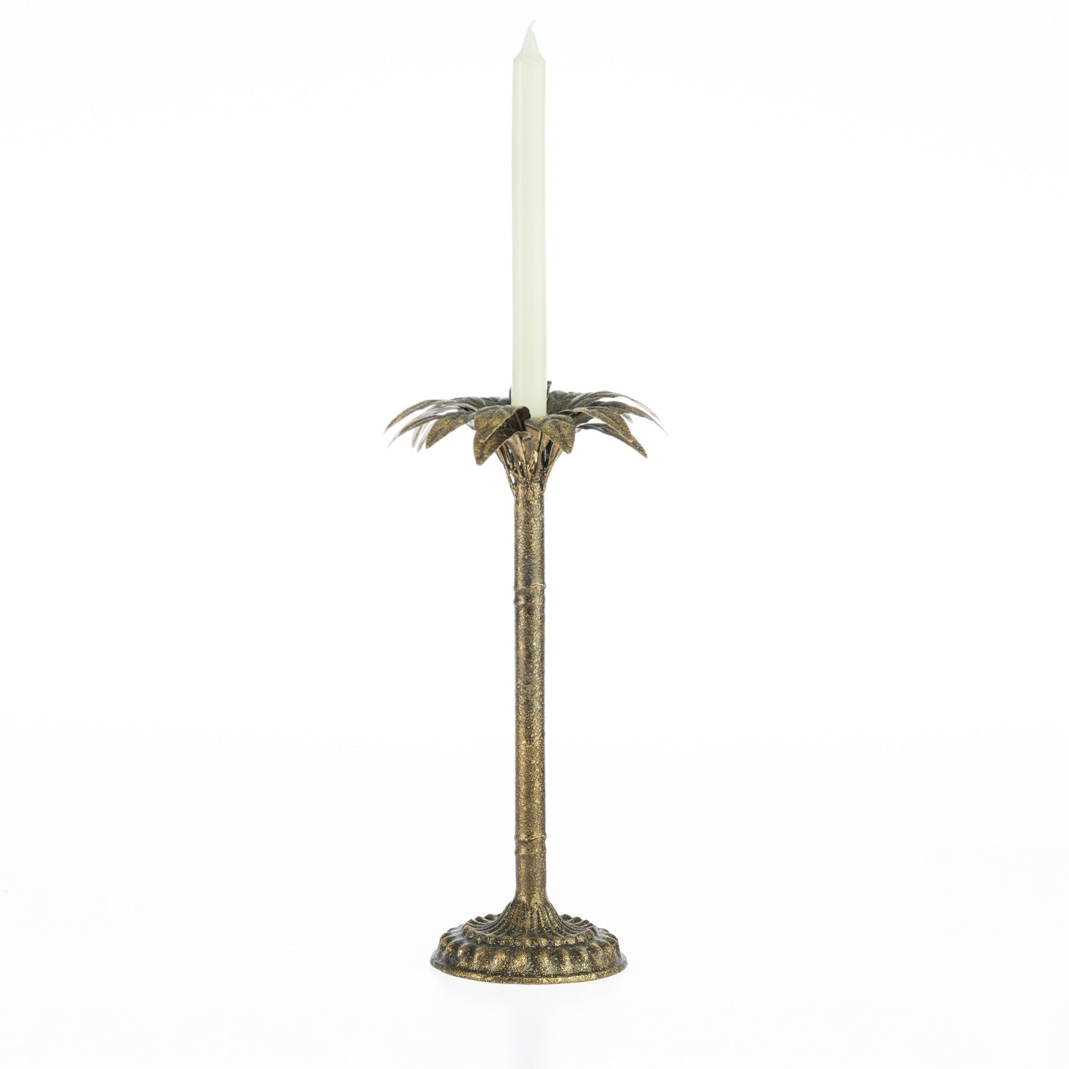 Pewter palm tree candle holder with a tall ivory tapered candle on a white background.