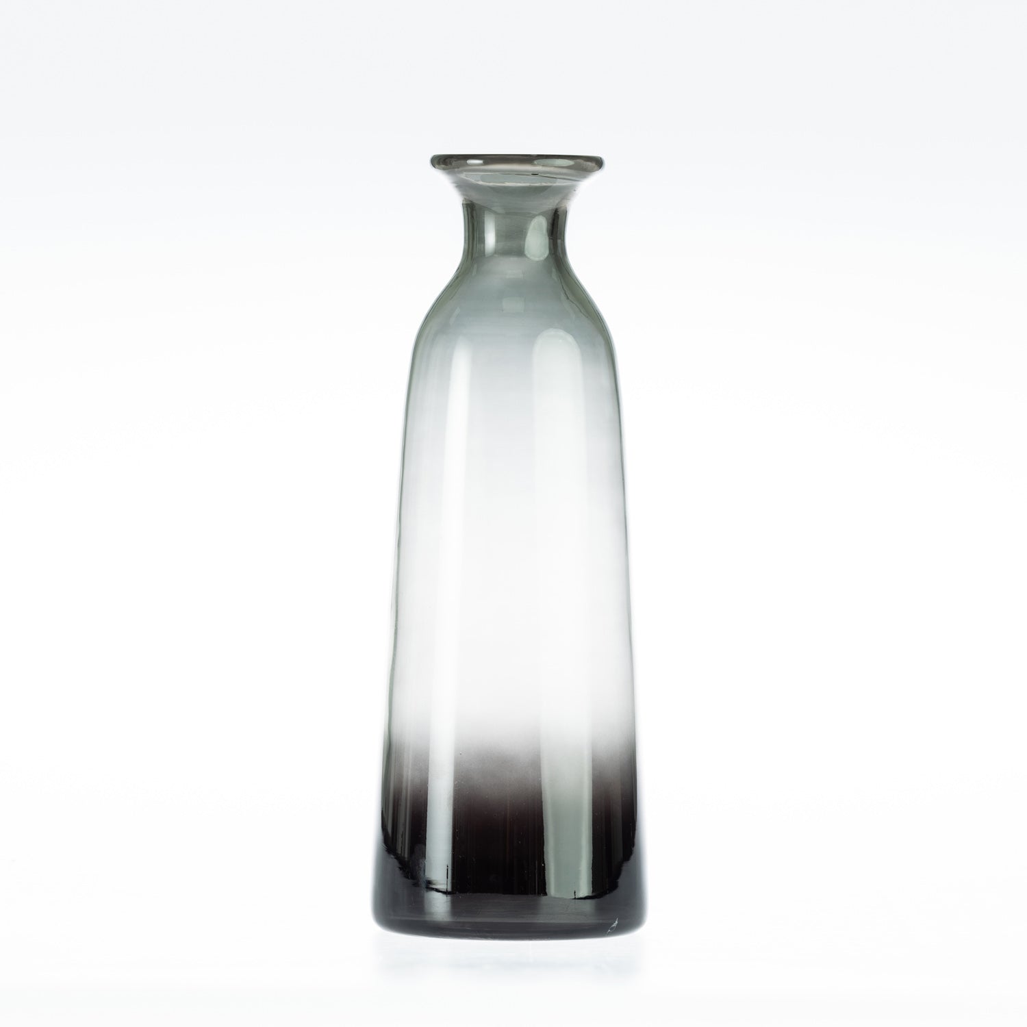 Smoke grey glass bottle vase on a white background.