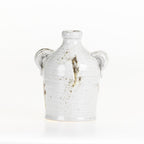 Large Cove Franco Ceramic Ears Vase with decorative ear handles and a reactive glaze finish on a white background.