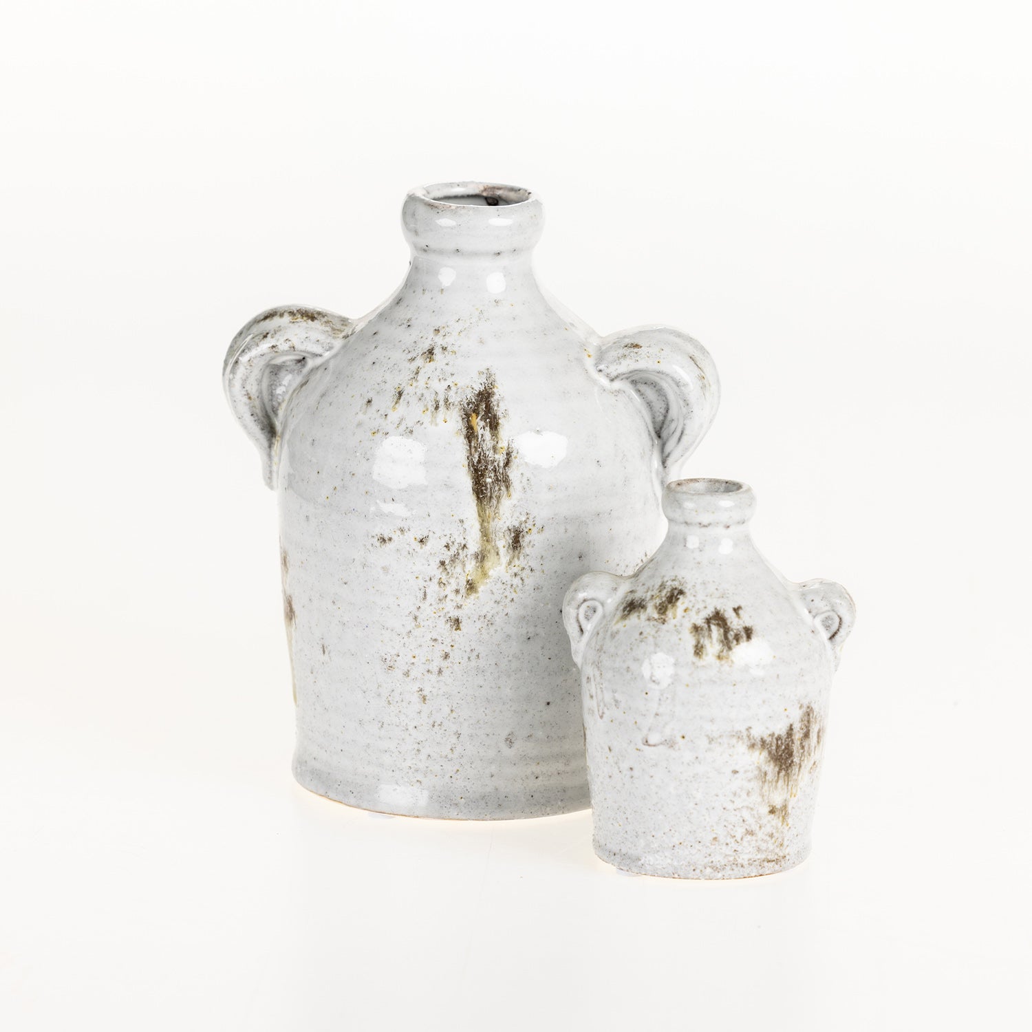 Large and small Cove Franco Ceramic Ears Vases in a reactive glaze finish displayed together on a white background.