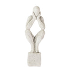 Cove Grayson Man In Thought Ornament in Natural, large size, featuring an abstract seated figure resting its face in its hands.