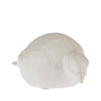 Cove Ceramic Bird Searching Ornament in Natural, featuring a glossy ceramic bird with its head lowered.