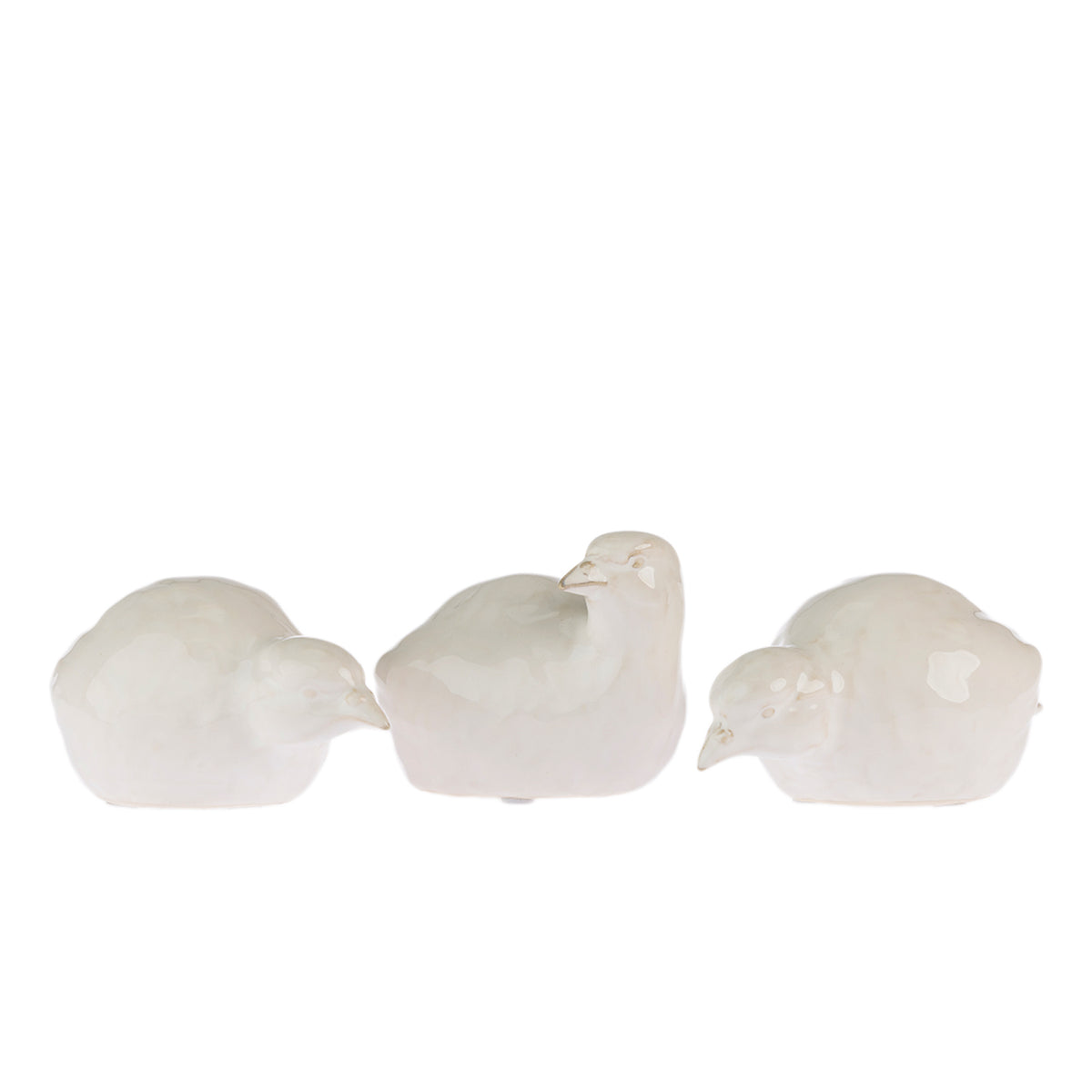 Cove Ceramic Bird Ornament collection in Natural, showing three glossy ceramic birds in assorted poses.