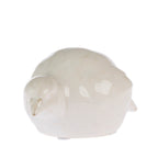 Cove Ceramic Bird Resting Ornament in Natural, featuring a glossy ceramic bird in a rounded resting pose.