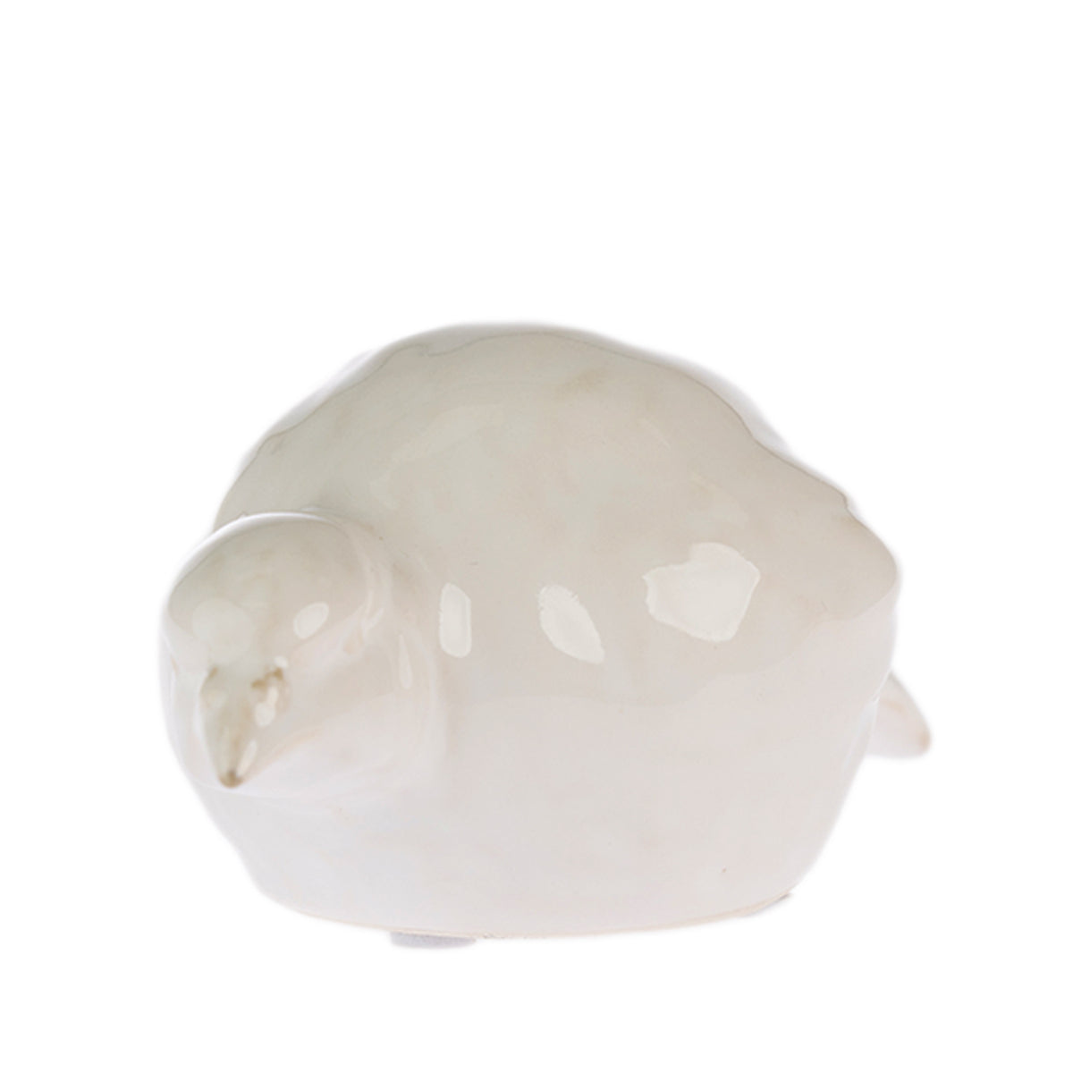 Cove Ceramic Bird Resting Ornament in Natural, featuring a glossy ceramic bird in a rounded resting pose.