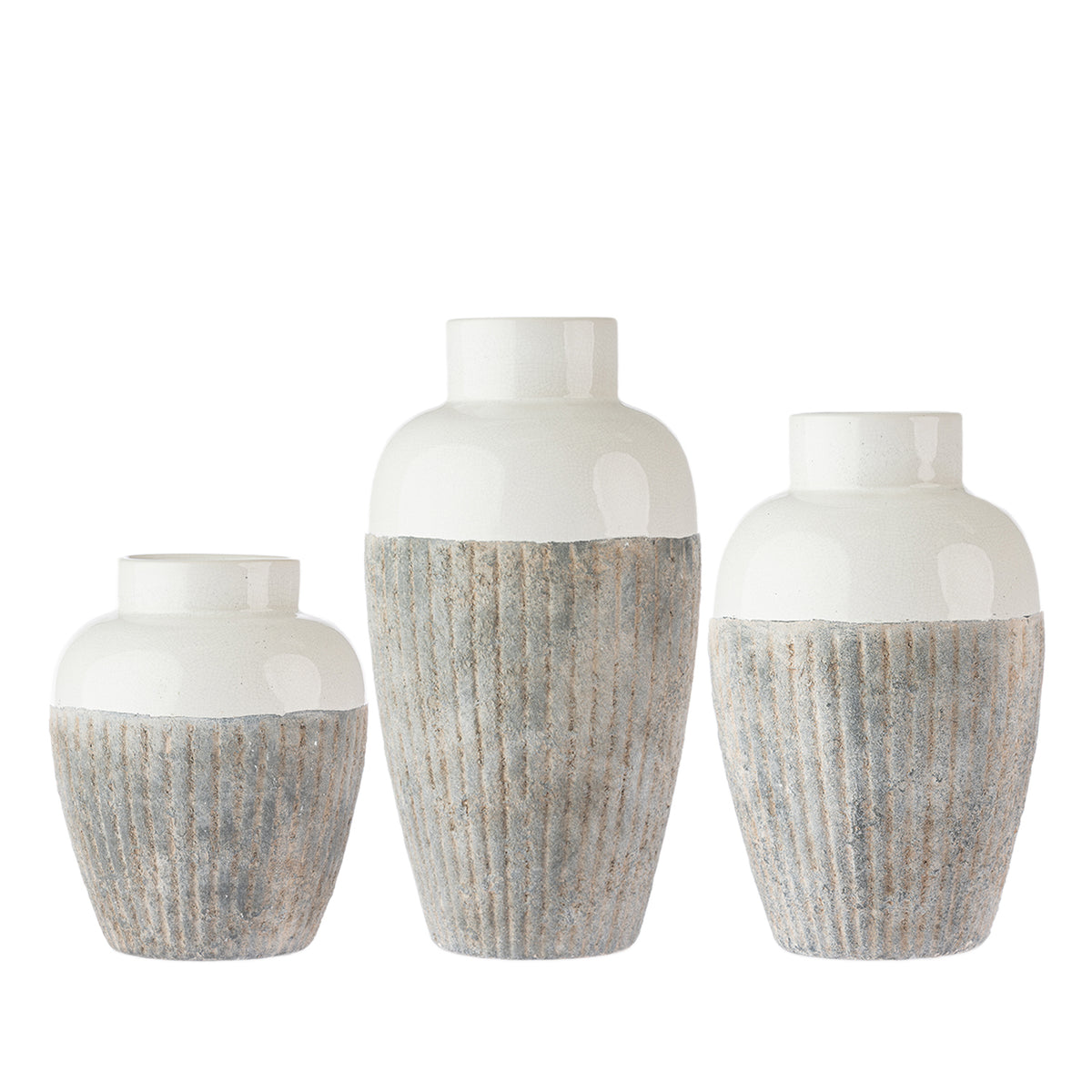 Cove Creole Ceramic Vase collection in Natural, showing Small, Medium and Large sizes together.