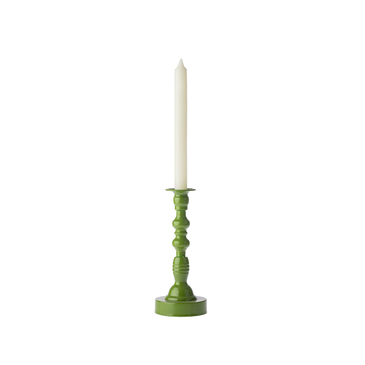 Green decorative candle holder displayed with a tall white taper candle against a white background.