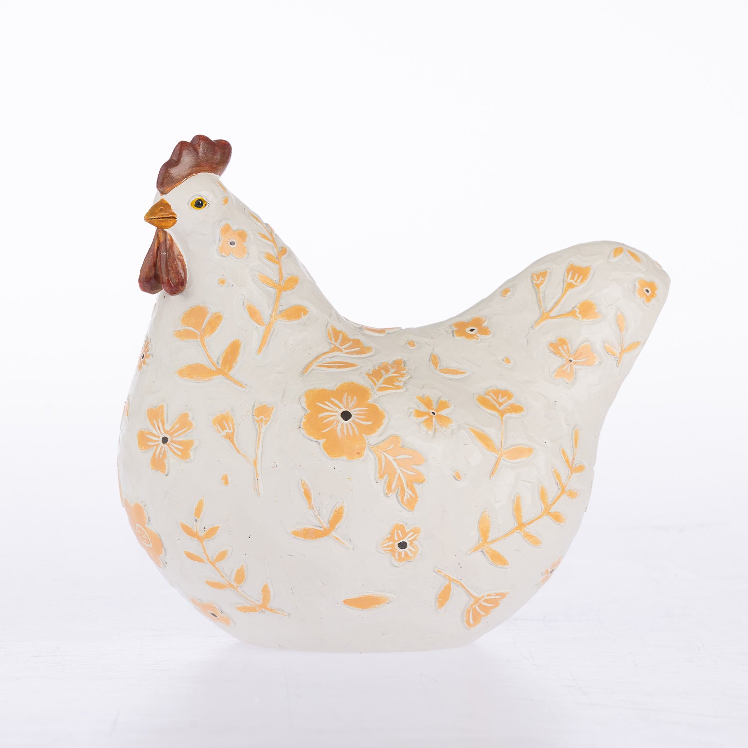 A ceramic decorative chicken figurine with a textured off-white body, decorated with orange floral patterns and a brown comb and wattle, set against a plain white background.