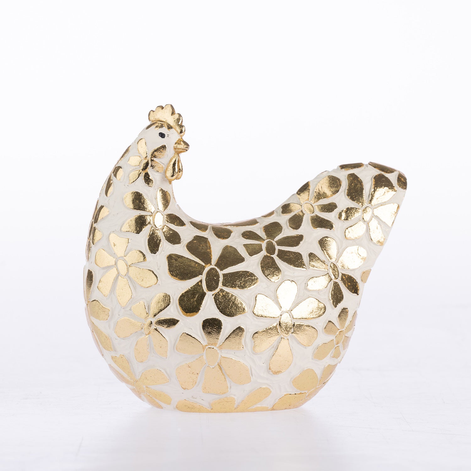 A decorative chicken figurine with a glossy white body and metallic gold floral pattern, set against a plain white background.