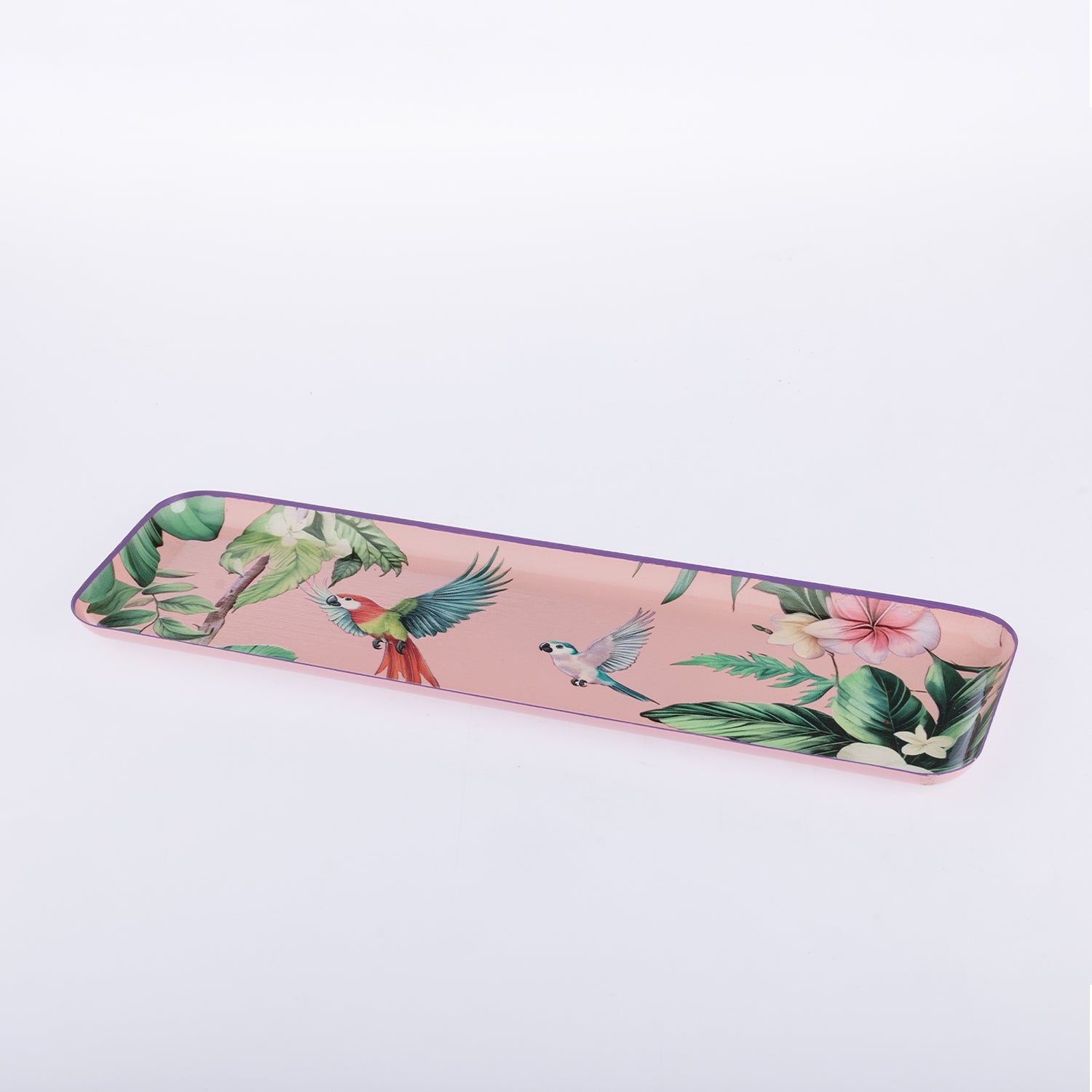A rectangular pink tray with a tropical print featuring green leaves, parrots, and a pink hibiscus flower, shown on a clean white background.