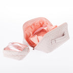 Open Pale Lilac quilted toiletry bag showing internal compartments and a matching removable clear pouch.