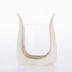 Ivory textured candle holder with a curved sculptural frame and clear glass insert.