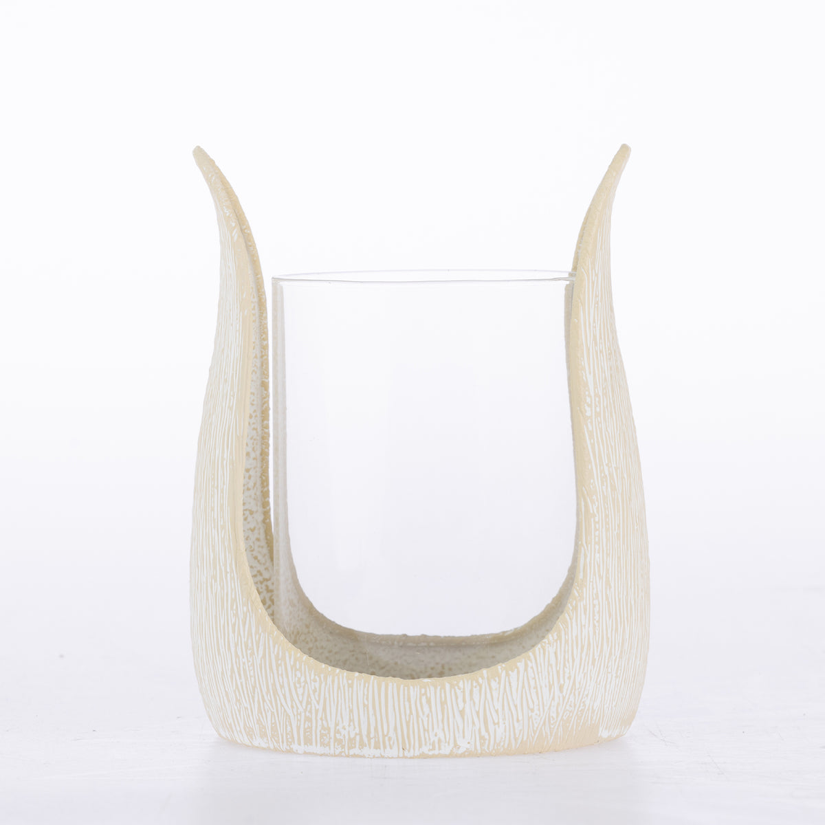 Ivory textured candle holder with a curved sculptural frame and clear glass insert.
