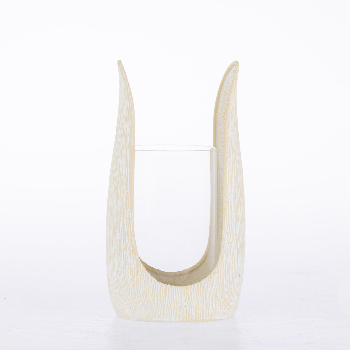 Ivory textured candle holder with a curved sculptural frame and clear glass insert.