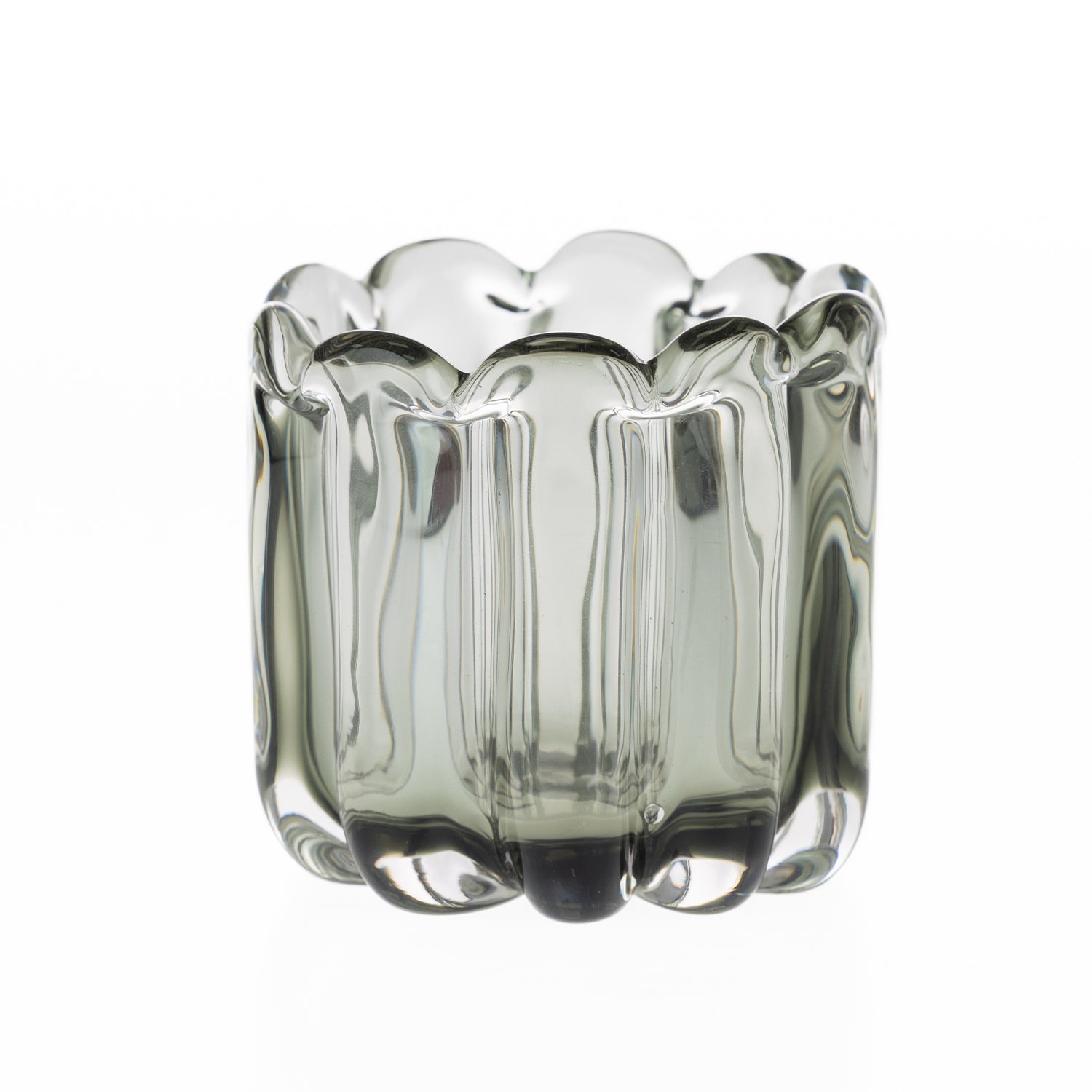 Smoked grey hand-blown glass bud vase with a scalloped rim and ribbed curved design, displayed against a white background.