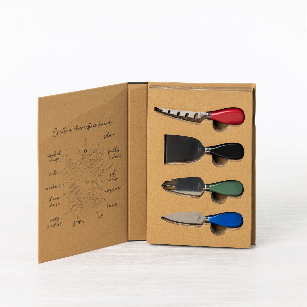Gather 4 Piece Cheese Knife Set Multi-Coloured displayed in open gift packaging with four different cheese serving utensils and colourful handles.