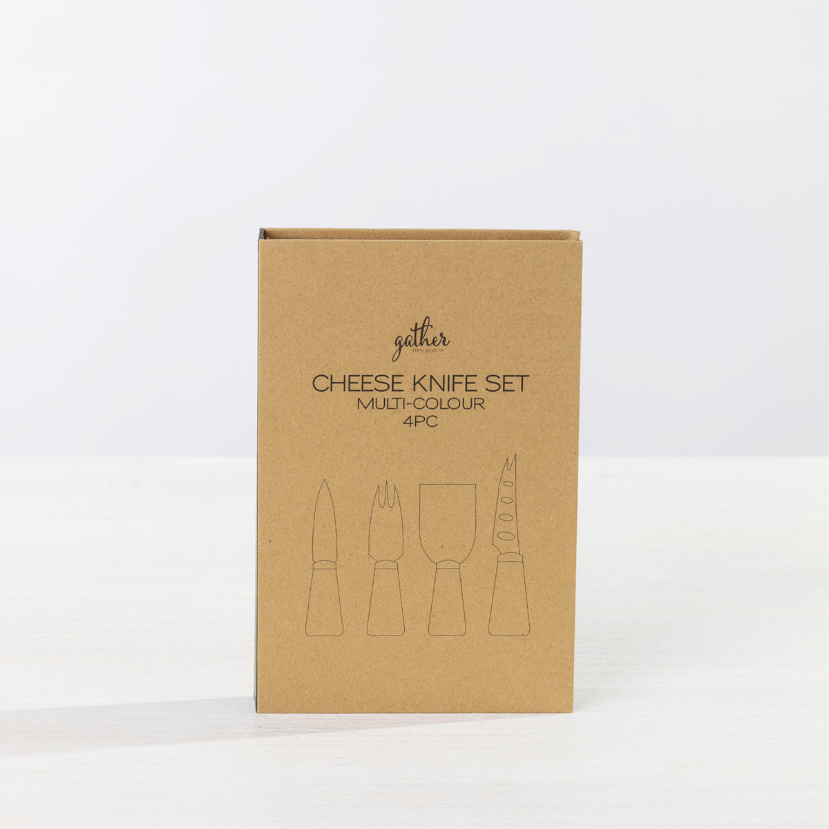 Gather 4 Piece Cheese Knife Set Multi-Coloured presented in a closed kraft cardboard gift box with illustrations of the four cheese utensils.