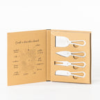 Gather 4 Piece Cheese Knife Set Silver displayed in open gift packaging with four different stainless steel cheese utensils and sleek silver open-handle designs.
