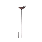 A decorative metal garden stake with a scalloped flower bowl, perched bird accent, and ground prongs is shown isolated against a plain light background.