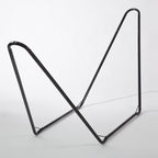 Black metal bookend on a white background