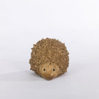 Outsidings Walter Garden Hedgehog in natural, shown from the front with a rounded floral-textured body and sweet woodland design.