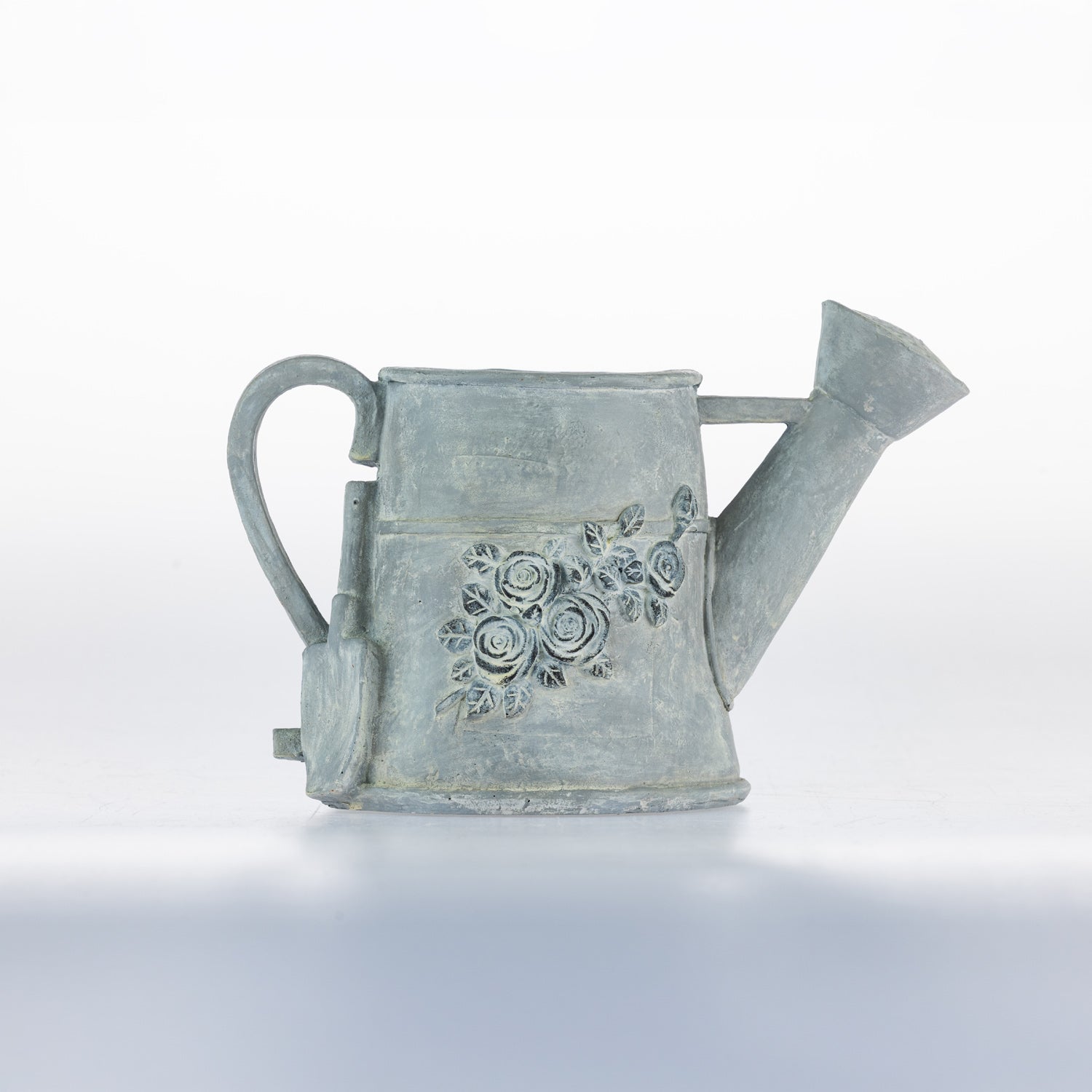 Outsidings Brynn Watering Jug Planter, featuring a vintage-inspired watering can shape with a distressed grey finish and embossed floral detailing.