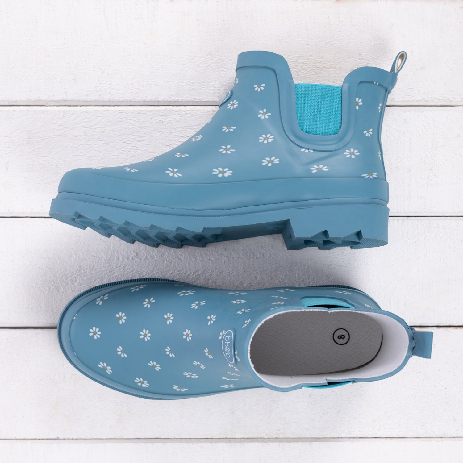 Outsidings Ankle Boot Blue Bloom in Blue, featuring a blue finish with small white daisy motifs, elastic side panels and a matching blue sole.