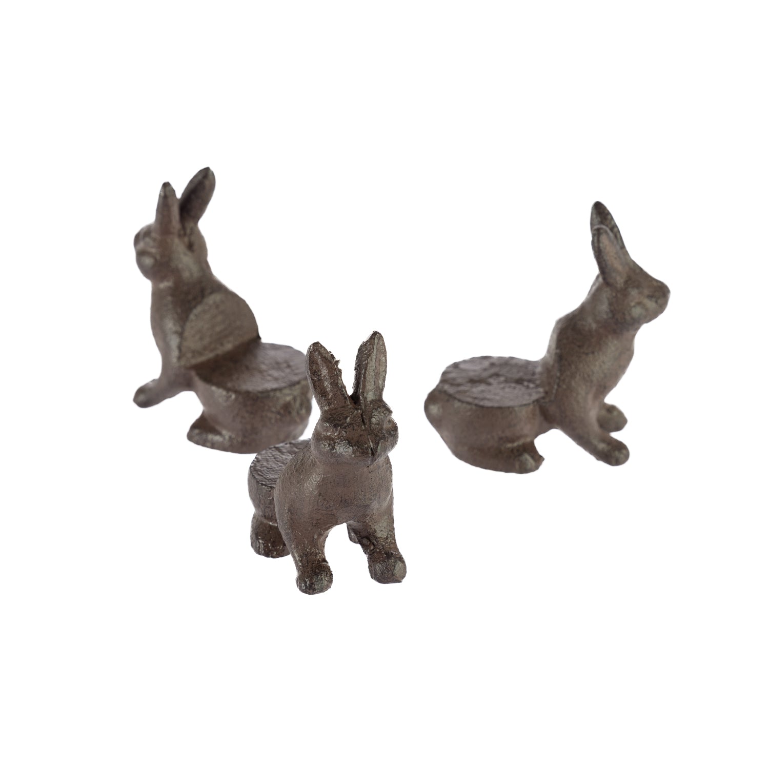 Three small brown rabbit-shaped decorative supports are shown from different angles against a plain light background.