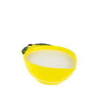 Outsidings Sultry Citronella Candle in Lemon, featuring a bright yellow lemon-shaped ceramic vessel with green leaf detailing and white wax.
