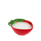 Outsidings Sultry Citronella Candle in Strawberry, featuring a red strawberry-shaped ceramic vessel with raised seed detailing, green leaves and white wax.