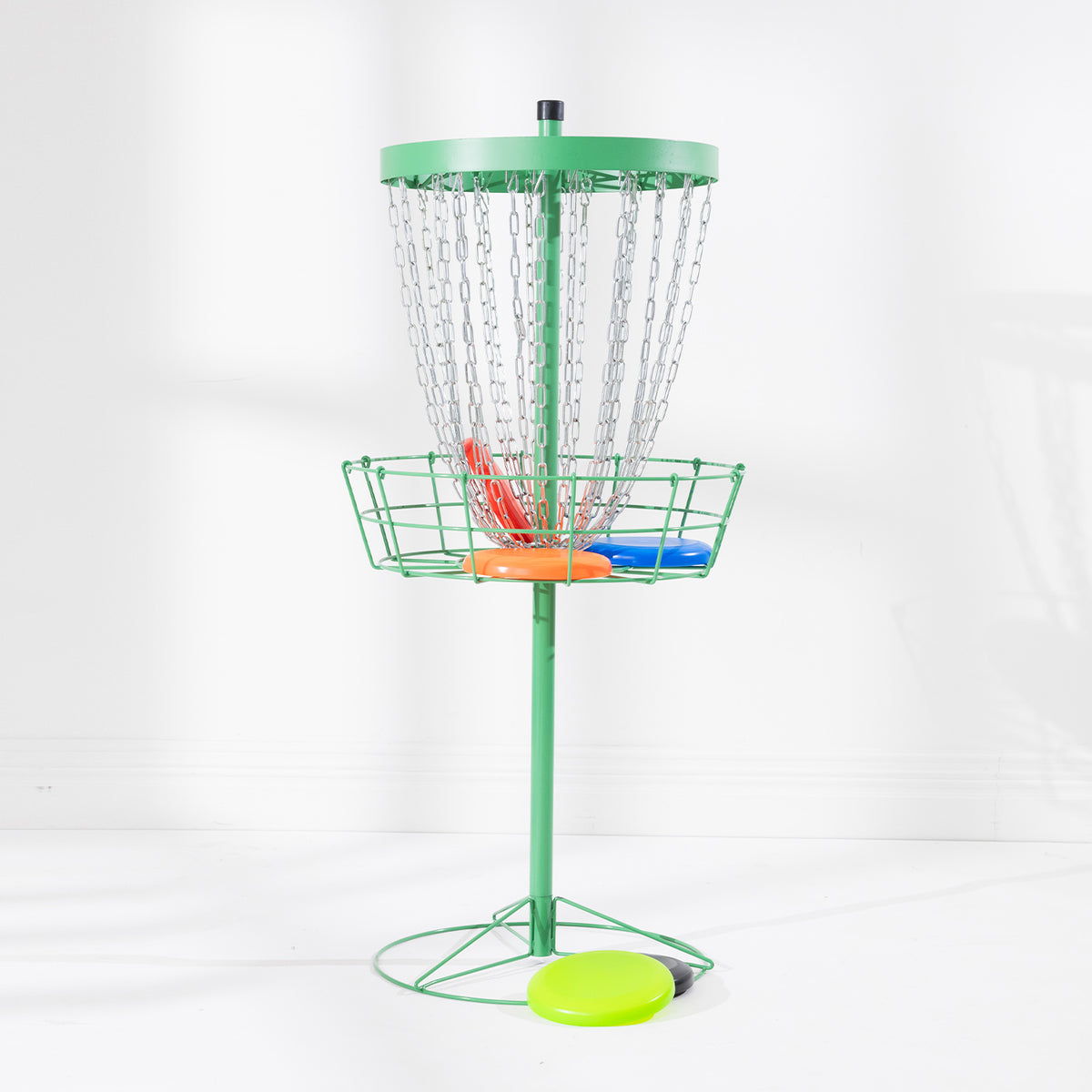 Play the Field Disc Golf set with green metal target, hanging chains and colourful flying discs.