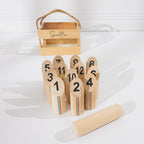 Play the Field Scattle set with 12 numbered wooden pins, throwing baton and timber carry crate displayed behind.