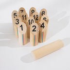 Play the Field Scattle set with 12 numbered wooden pins and a wooden throwing baton.
