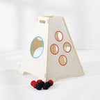 Play the Field Tower Ball wooden target tower shown from another angle with coloured target holes and red and black balls in front.