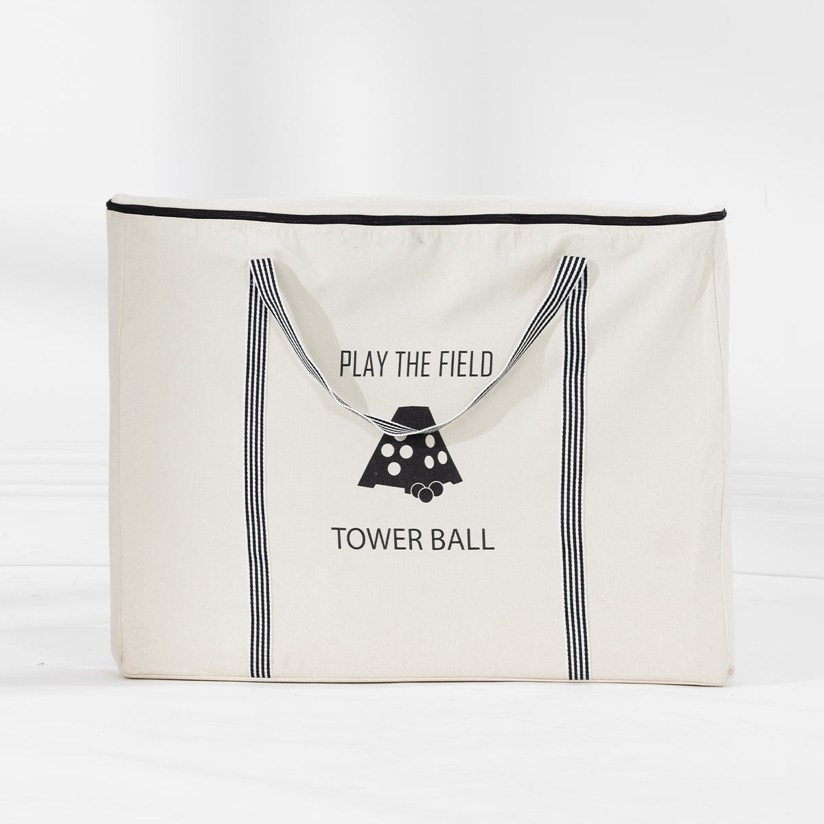 Play the Field Tower Ball game packed in a cream zippered carry bag with black handles and printed detailing.